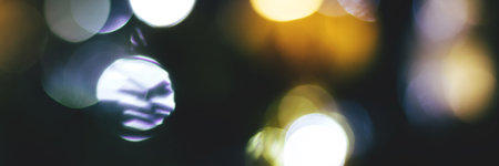 Blurred lights abstract background, banner texture. Defocused bokeh header. Wide screen wallpaper. Panoramic web banner with copy space for design.の写真素材