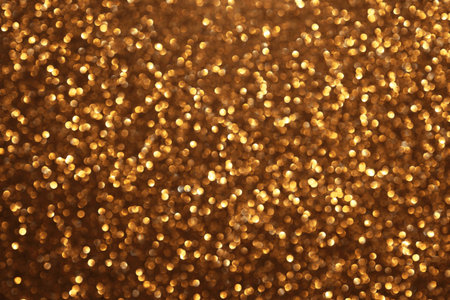 Golden glitter festive bokeh background, abstract defocused texture. Holiday lightsの写真素材