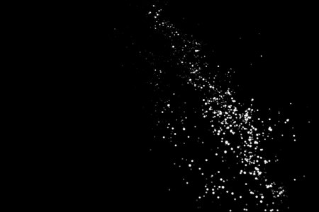 White gray blurred bokeh lights on black background. Glitter sparkle stars for celebrate. Overlay for your designの写真素材