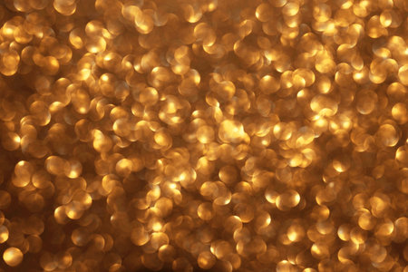 Golden glitter festive bokeh background, abstract defocused texture. Holiday lightsの写真素材
