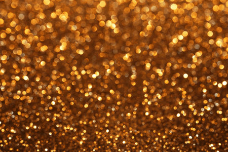 Golden glitter festive bokeh background, abstract defocused texture. Holiday lightsの写真素材