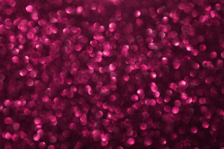 Pink glitter bokeh background with defocused sparkling lights, abstract shiny texture. Holiday lights.の写真素材