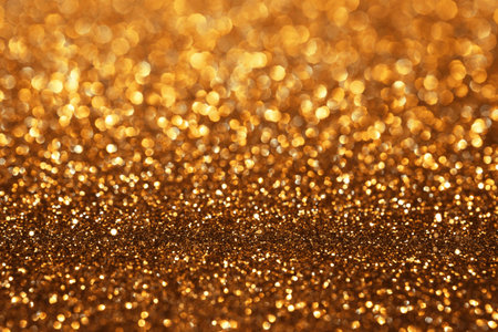 Golden glitter festive bokeh background, abstract defocused texture. Holiday lightsの写真素材