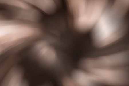 Spiral vortex brown, mocha mousse soft blurred abstract gradient background. Demonstrating color, trend 2025 year.の写真素材