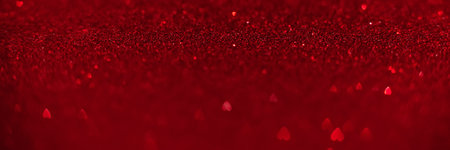 Red hearts, sparkling glitter bokeh background banner, valentines day abstract defocused texture header.の写真素材