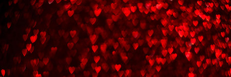 Red hearts, sparkling glitter bokeh background banner, valentines day abstract defocused texture header.の写真素材