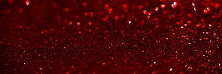 Red hearts, sparkling glitter bokeh background banner, valentines day abstract defocused texture header.の写真素材