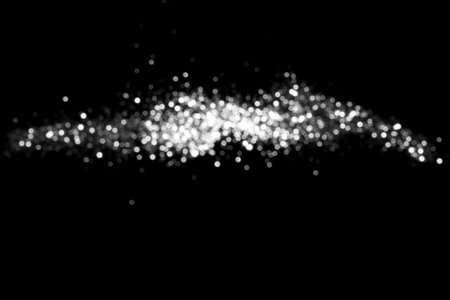 White gray blurred bokeh lights on black background. Glitter sparkle stars for celebrate. Overlay for your designの写真素材