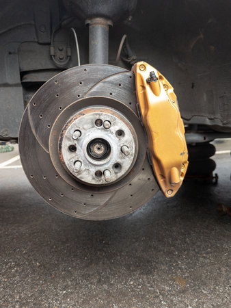 Car brake disc and caliper, automotive component, detailed view.の写真素材