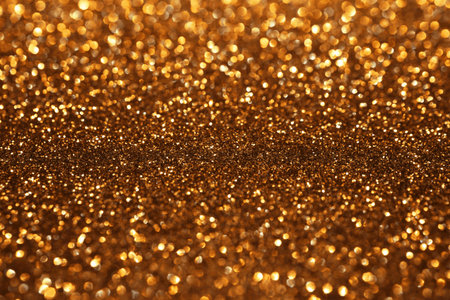 Golden glitter festive bokeh background, abstract defocused texture. Holiday lightsの写真素材