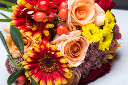 Autumn wedding bouquet close up with flowers and berries. Picture taken in the studio.の写真素材