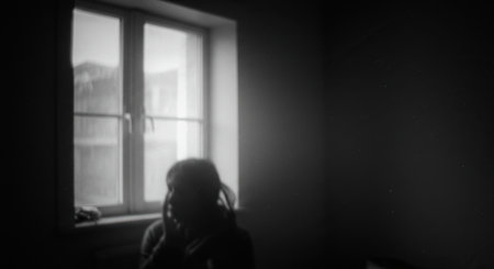 This atmospheric monochrome art evokes feelings of introspection and solitude, portraying a person immersed in thought while seated near a window in a dimly lit interior space.の素材