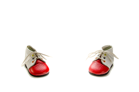 Baby booties on a white background.の写真素材