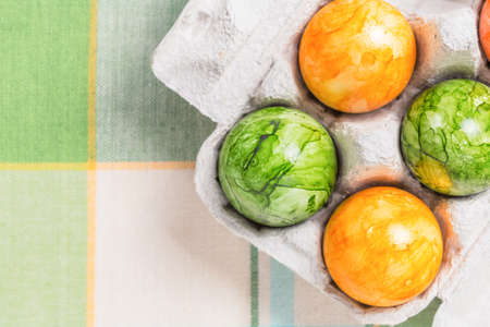 Colored eggs in boxの写真素材