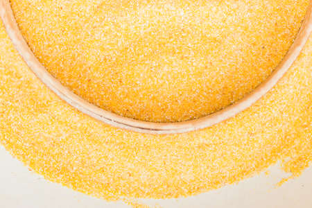 Above view of flour sieve on corn flourの写真素材