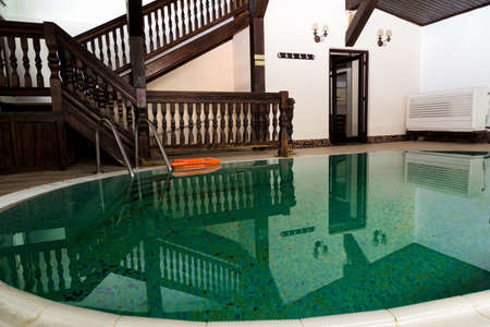 Mirroring Swimming pool with stairの写真素材