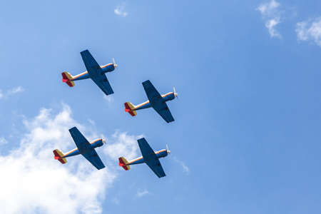 Formation of four planes in the airの写真素材