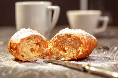 Breakfast with croissant with cream and coffeeの写真素材
