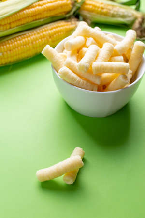 Pufuleti made from corn over green backgroundの写真素材