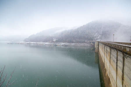 Winter snowy day at the Mount Izvorul Dam, Bicaz Lake, located in Piatra Neant, Romania