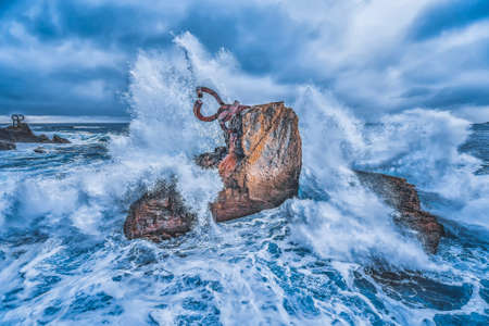 A big wave on a statue