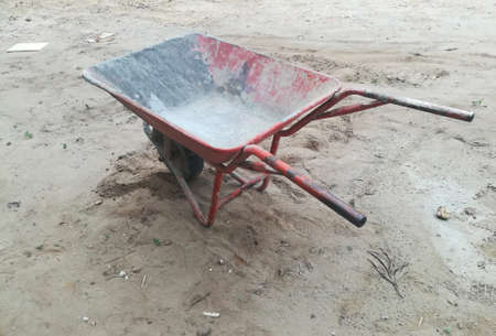 Old Wheelbarrow On The Ground