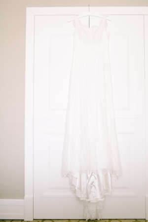 Wedding dress hanging on the wardrobe.の写真素材