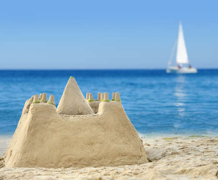 Sand Castle on Beach on summer dayの写真素材
