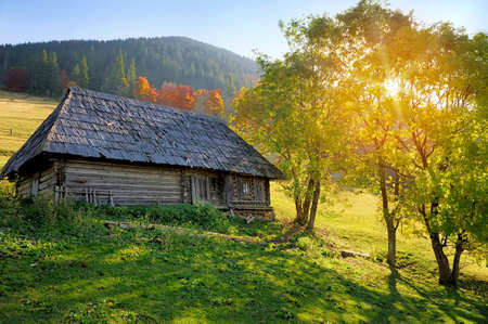 Mountain autumn landscape with houses
