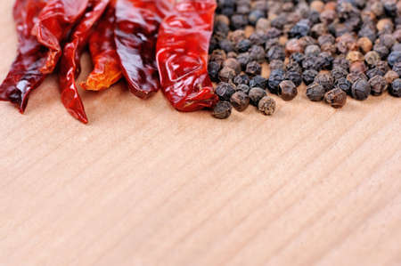 Peppers on wooden boardの写真素材