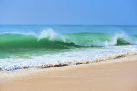 Ocean waves and blue skyの写真素材