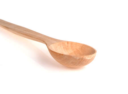 Wooden spoon isolated on white backgroundの写真素材