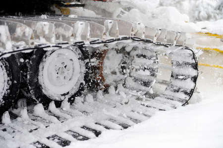 Closeup shot of snowplow used for ski slope preparationの写真素材