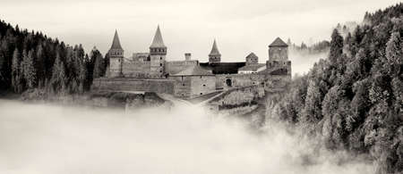 Castle in the high mountains with fog fallのeditorial素材