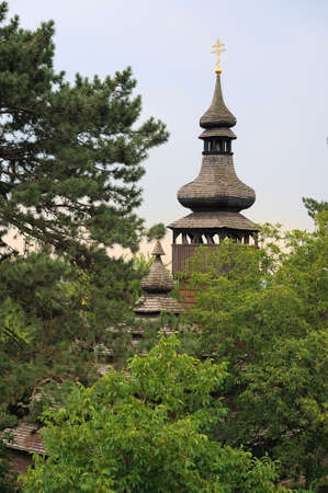 Spring landscape with wooden orthodox churchの写真素材