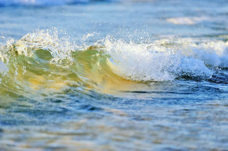 Beach Wave, view in the tube with beach in backgroundの写真素材
