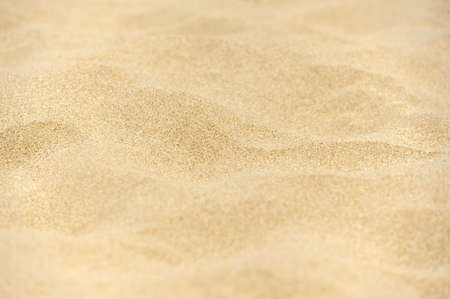 Closeup of sand pattern of a beach in the summerの写真素材