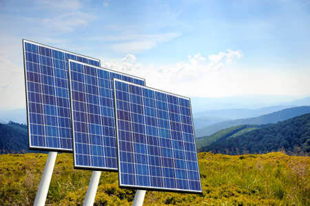 Three solar panels on nature background in sunny day