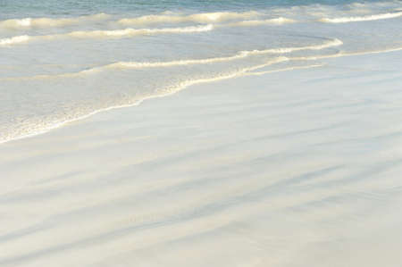 Soft wave of the sea on the sandy beach