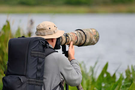 Professional wildlife photographer outdoorの写真素材
