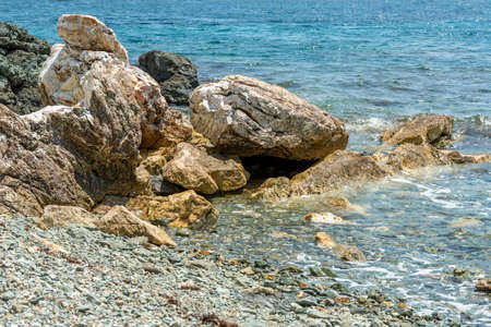 Beautiful landscape with sea, the rock and the beautiful clouds in the blue sky