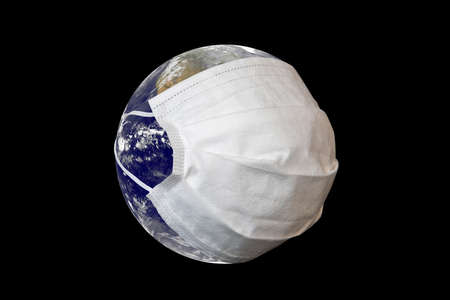 Planet Earth with face mask protect on dark. World medical concept. Elements of this image furnished by NASAの写真素材