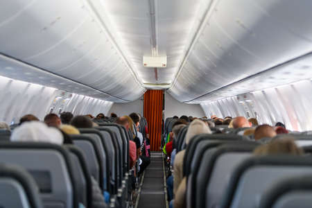 Photo of the aircraft econom class interior of the airplaneの写真素材