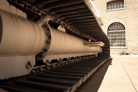 A close-up view of a tank's caterpillar