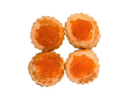 Four sandwiches with red caviar isolated on whiteの写真素材