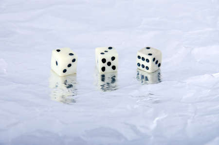 Playing bones on an aluminium foilの写真素材