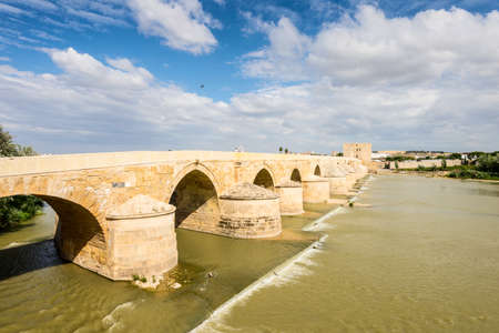 Old Roman bridge over the Guadalquivir River in Cordoba, Spain. の写真素材