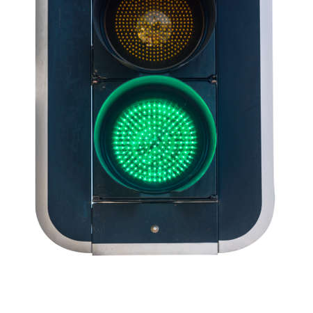 Close-up on a green traffic light. Isolated on white background.
