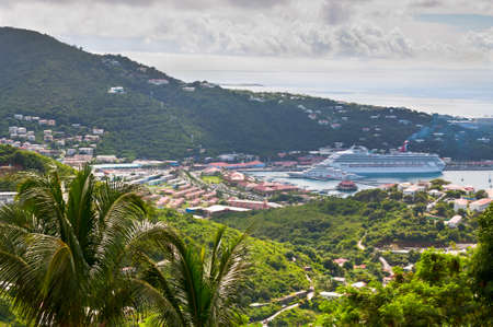 St. Thomas U.S. Virgin Islands  December 5 2011: The Carnival Victory cruise ship is moored in the Charlotte Amalie Cruise Port of St. Thomas US Virgin Islands.のeditorial素材