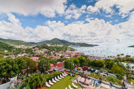 Charlotte Amalie St. Thomas US Virgin Islands  December 5 2011: A view from above the town of Charlotte Amalie located on St. Thomas in the US Virgin Islands. A cruise ship luxury yachts and sail boats are in port.のeditorial素材